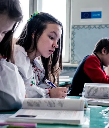 Grade eight students practice reading at secondary school number 5, in Krasnohorivka, Donetsk Oblast, Ukraine, Tuesday 21 November 2017. The students are among those who had to be transferred from nearby school number 2 after it was severely damaged by a shell in May 2017.