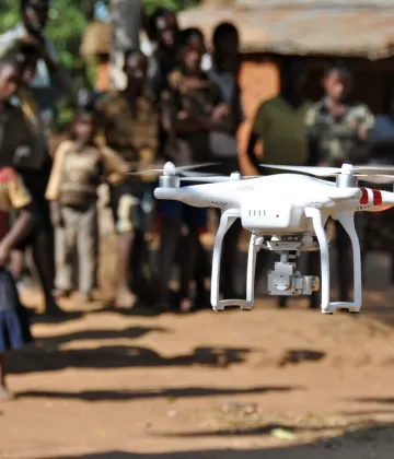 A drone operated by Chief Air Traffic Controller Steve Mkandawire, one of five Civil Aviation certified pilots, takes off during a demonstration for residents in Thipa vllage, Kasungu District, Malawi, Thursday 29 June 2017. Thipa village is 19 kilometres from the nearest health centre in Dwangwa and the only way to get there is either by bicycle or walking for four hours.
