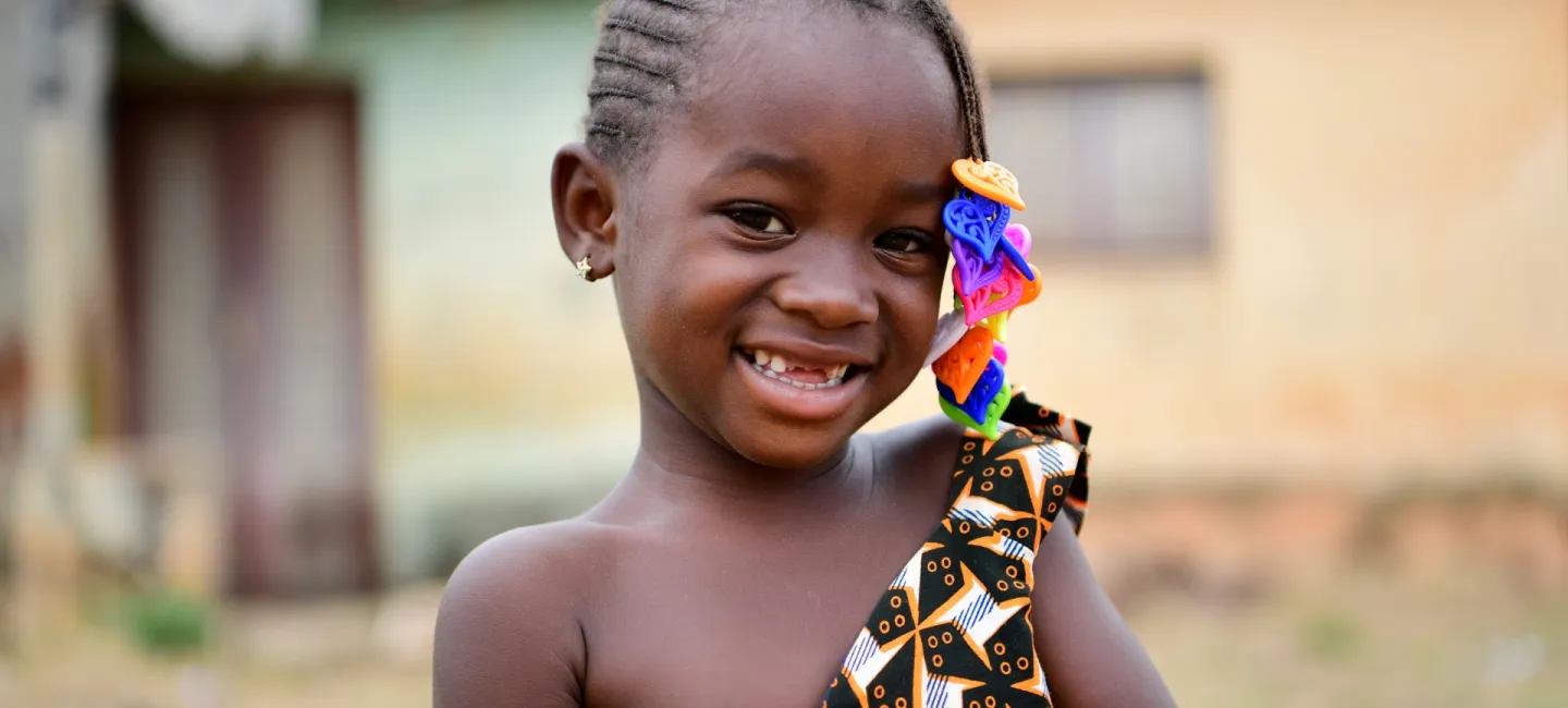 A happy girl in the village of Kpatrakaha, in the region of Korhogo, in the North of Côte d’Ivoire.